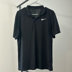 Men’s Nike dri-fit polo. Size M